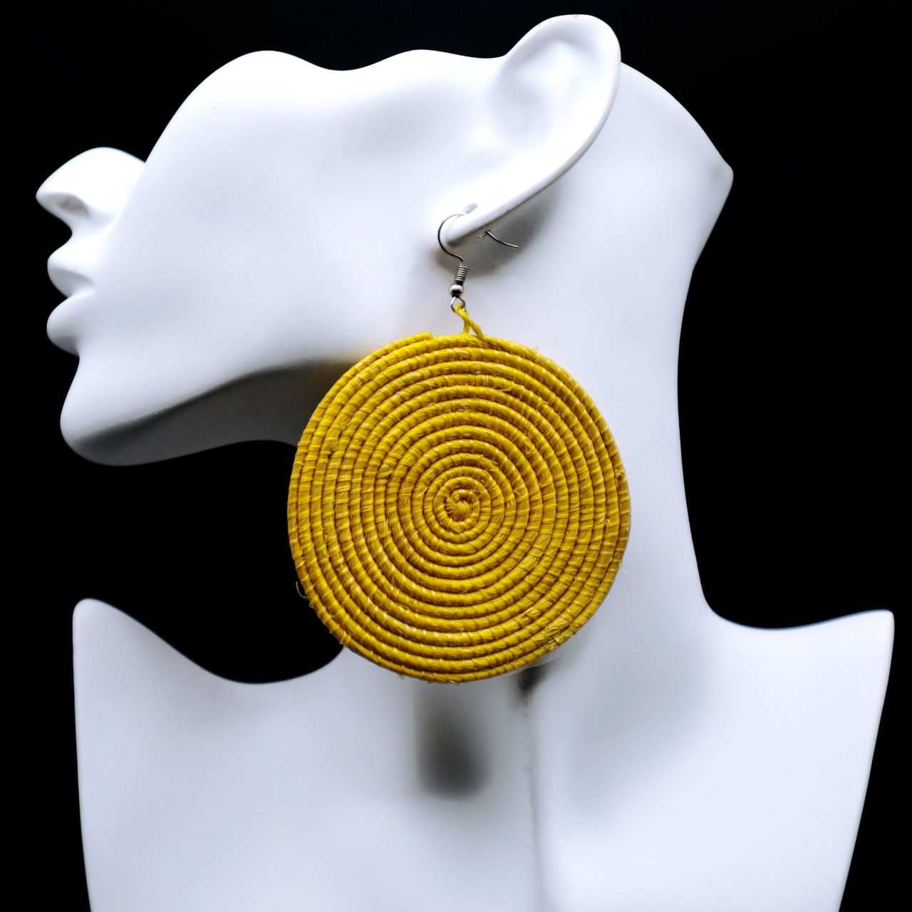 Single woven circular earrings