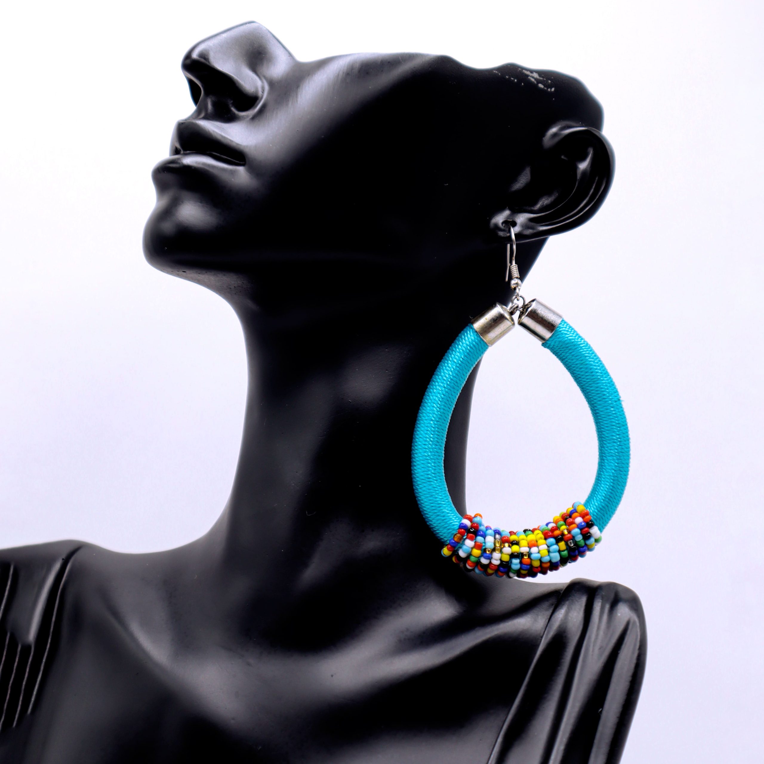Second image of African inspired string wrap hoop earrings